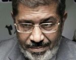 حبس مرسي 15 يوماً بتهمة التخابر مع حماس واقتحام السجون